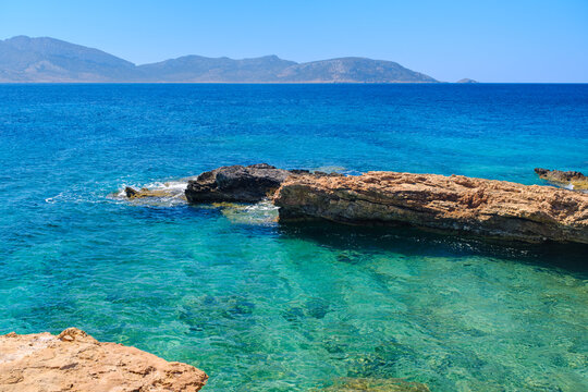 Rocky coastline with Aegean Sea, Koufonisi, Cyclades, Greece