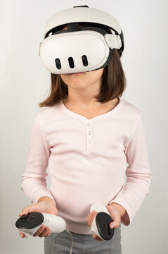 Kid girl using VR helmet