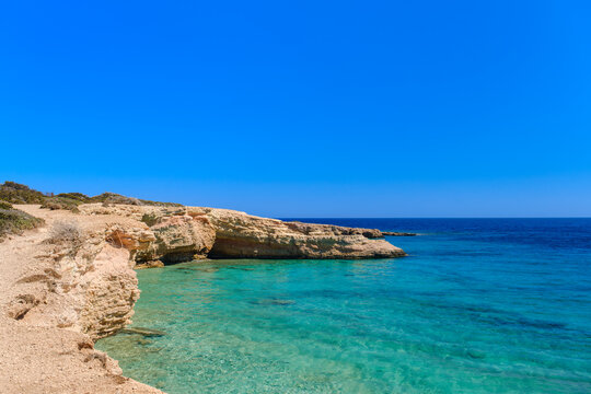 Rocky coastline with Aegean Sea, Koufonisi, Cyclades, Greece