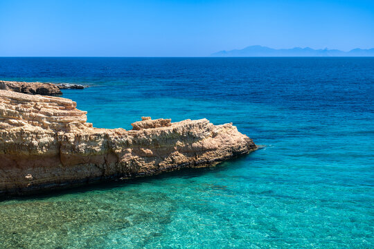 Rocky coastline with Aegean Sea, Koufonisi, Cyclades, Greece
