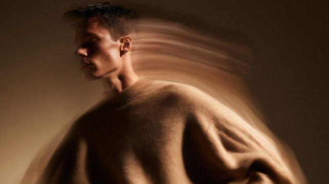 Conceptual Portrait of Young Man with Motion Blur Effect