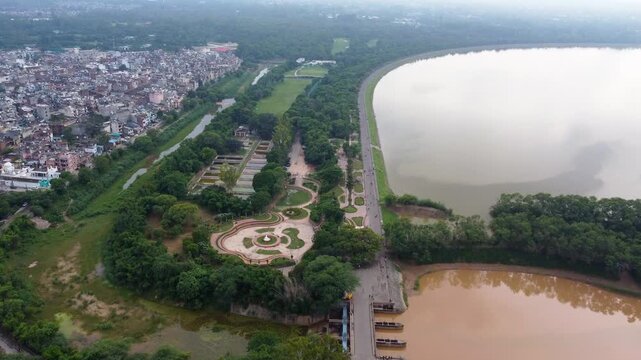 Panoramic Drone Flight over Sukhna Lake Dam, kishangarh and Shanti Kunj Buddha Statue from Saketri, Chandigarh