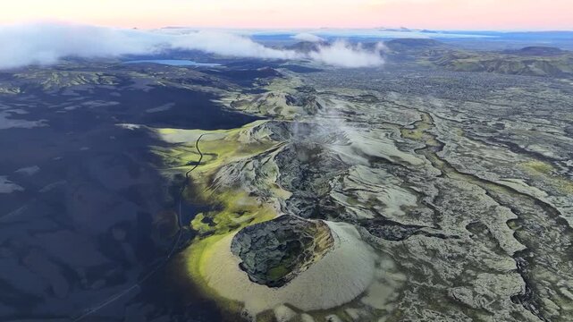 Aerial view of the Laki volcanic crater surrounded by vast moss-covered lava fields and rugged terrain in Kirkjubaejarklaustur, Skaftarhreppur, Iceland.