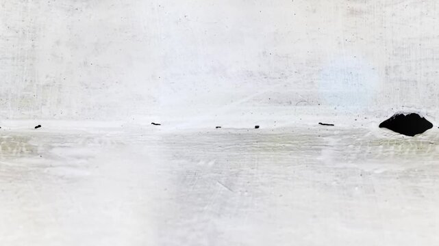 Seamless 4K looping vertical movement across a light concrete wall surface with subtle texture and minimal details. Perfect as a clean background for motion graphics and video projects.
