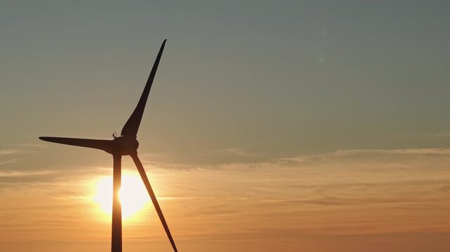  Wind turbine silhouette at sunset with copy space 