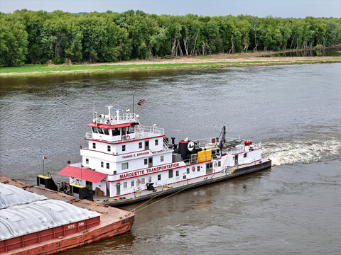 Savana, Illinois May 12, 2026 Thomas E. Erickson Tugboat Pushing Barges South down the Mississippi River Inland Waterway