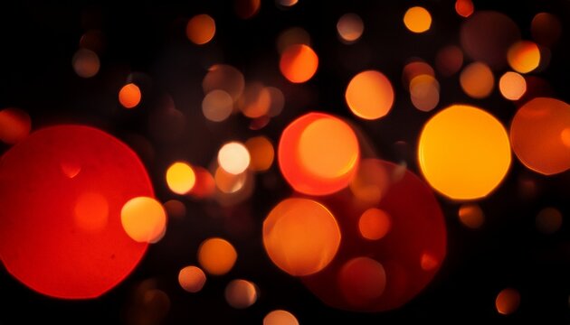 Abstract Blurred Red And Orange Light Orbs Against A Deep Black Background