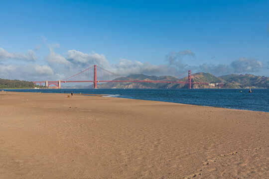Beautiful Golden Gate Bridge view from Crissy Field sandy beach in San Francisco