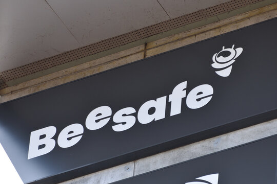 BeeSafe insurance company office facade with signage, logo, emblem. WARSAW, POLAND - APRIL 18, 2026