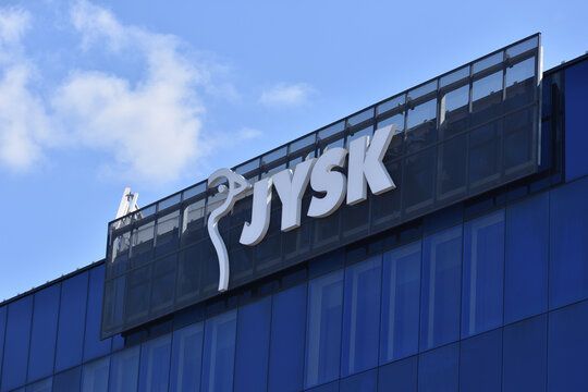 Jysk signage, emblem, logo on the facade of household goods and furniture store. WARSAW, POLAND - APRIL 18, 2026