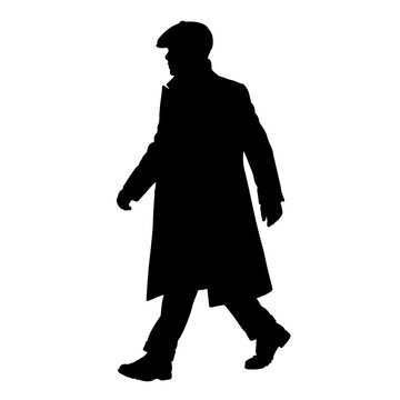 Silhouette of a man walking in an overcoat or flat cap detective 