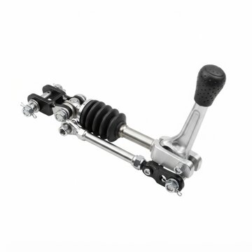 Close-up of manual gear shift linkage mechanism. Automotive transmission selector rod with bushings and ball joint assembly.