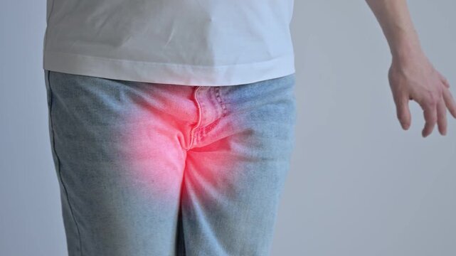 A woman suffers from pain Cystitis. Red circle. 