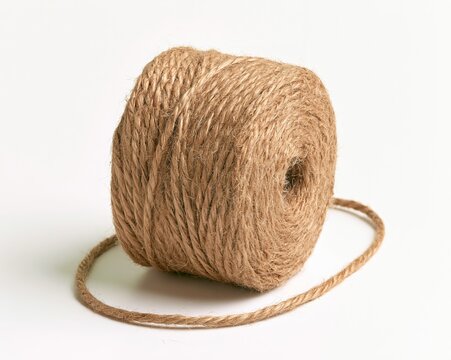 Coiled Jute String Roll on White Background
