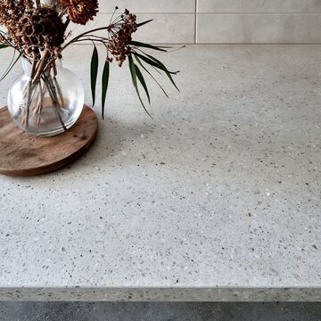 Minimalist countertop with botanical decor and simple natural elements