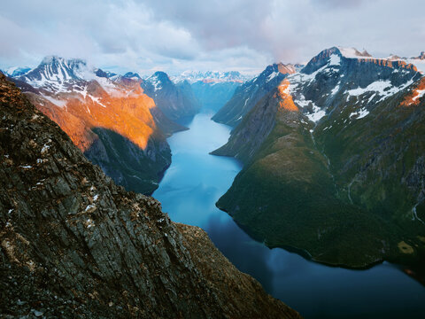 Norway aerial view lake Eikesdalsvatnet and sunset mountains landscape breathtaking scenery of More og Romsdal, summer season scenic nature travel beautiful destinations in Scandinavia