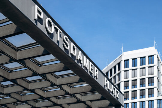 Berlin, Germany - April 23, 2026: Potsdamer Platz entrance canopy with iconic lettering and modern office towers in Berlin's business district.