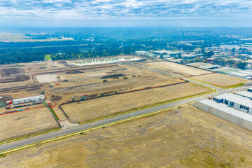 Obraz premium Drone aerial photograph of a large industrial construction site in The Nepean Business Park precinct in the Greater Western Sydney town of Penrith in New South Wales, Australia
