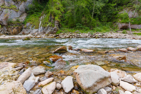 Rushing River Water and Rocks in the Scenic Ammer Gorge Scheibum