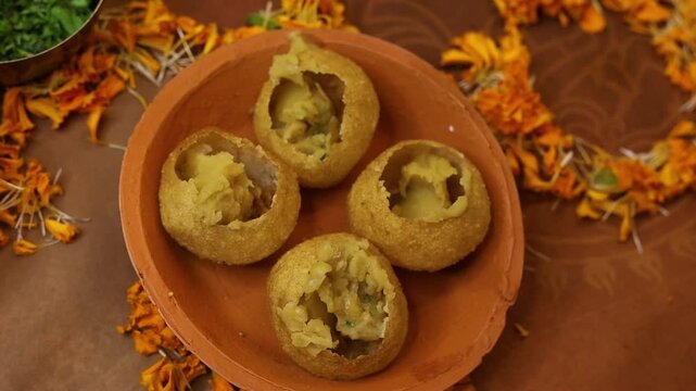 Dahi puri or dahi batashe an indian sweet,tangy and spicy snack