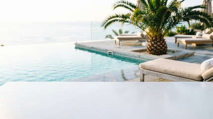 Fototapeta premium Infinity Pool with Ocean View and Lounge Chairs for Luxury Lifestyle