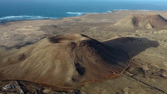 Aerial view over La Mancha craters in the volcanic Area of the Bayuyo, on the Island of Fuerteventura, Spain.