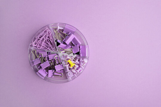 Purple office supplies in a circular organizer