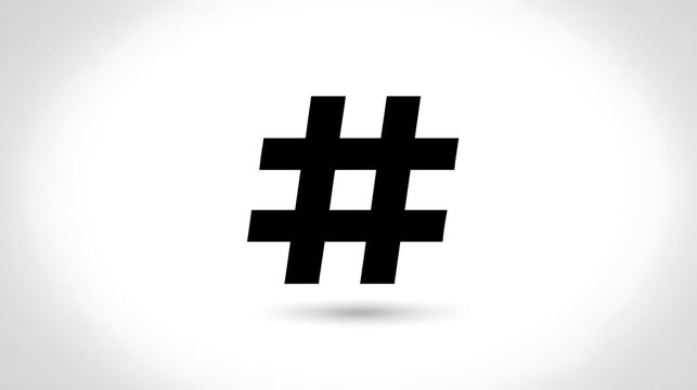 A stark black hashtag symbol rendered in high contrast against a subtle gradient background. The symbol casts a soft shadow below it, suggesting a subtle depth.