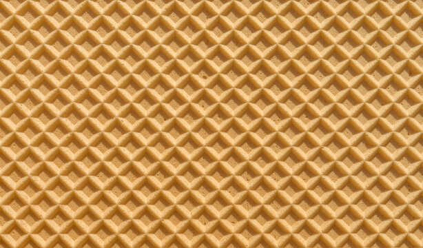 Baked waffle pattern, texture background close up
