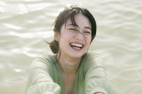 Joyful water wellness portrait of a smiling woman in soft light