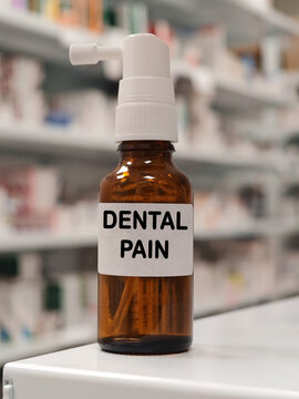 DENTAL PAIN oral medicinal spray for relief of mouth, gum or dental discomfort in front of pharmacy warehouse drawers