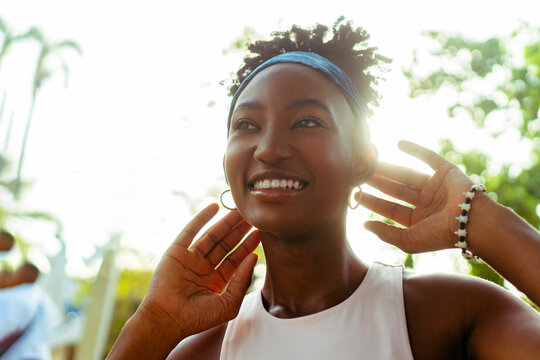 African woman feeling positive emotion outdoors