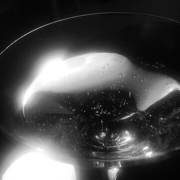 Black and White Macro of Martini Glass Rim and Bubbles
