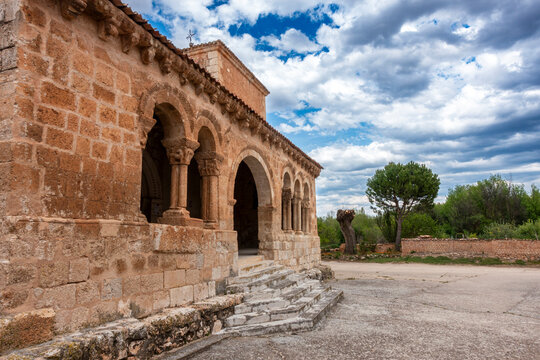 Romanesque porticoed gallery with semicircular stone arches at the Church of San Gines, an 11th-century Romanesque temple in Rejas de San Esteban, Soria, Castilla y Leon, Espana
