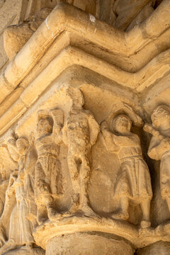 Carved Romanesque transitional capital showing two executioners flogging a bound man. Portal of Church of Nuestra Se&ntilde;ora de la Asunci&oacute;n, Tuesta (&Aacute;lava, Spain, late 12th&ndash;early 13th C)