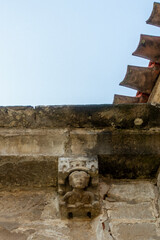 Romanesque-Gothic transitional carved corbel with human bust under canopy beneath eaves. Church of Nuestra Señora de la Asunción, Tuesta (Álava, Spain, late 12th–early 13th C) © Nandi Estévez