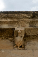 Transition Romanesque-Gothic carved stone corbel depicting a turtle figure under the roof eaves of the Church of Nuestra Senora de la Asuncion in Tuesta, Alava, Basque Country, Espana © Nandi Estévez