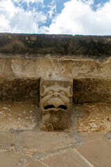 Transition Romanesque-Gothic carved stone corbel depicting a monstrous hybrid head under the roof eaves of the Church of Nuestra Senora de la Asuncion in Tuesta, Alava, Basque Country, Espana, dating  © Nandi Estévez