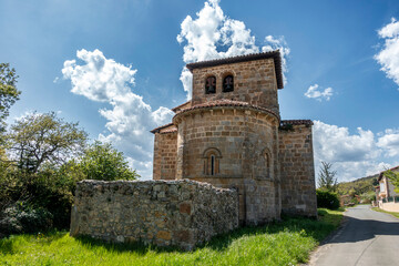 Exterior view of the Romanesque apse and bell tower of the Church of San Andres, 12th century, Tabliega, Las Merindades, Burgos, Castile and Leon, Spain © Nandi Estévez