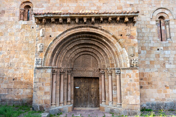 Main portal with decorated archivolts, relief tympanum, carved capitals, and corbels at the Collegiate Church of San Pedro, late 12th to early 13th century Romanesque architecture, Cervatos, Cantabria © Nandi Estévez