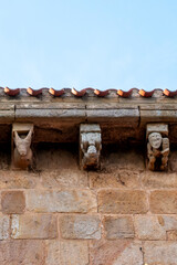 Romanesque corbels under the eaves of the Collegiate Church of San Pedro, 12th century, Cervatos, Campoo de Enmedio, Cantabria, Spain © Nandi Estévez
