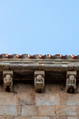 Romanesque corbels under the eaves of the Collegiate Church of San Pedro, 12th century, Cervatos, Campoo de Enmedio, Cantabria, Spain © Nandi Estévez