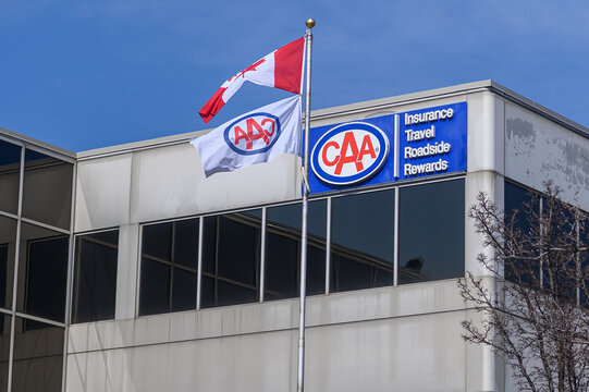 Company logos of CAA and Canada on display outside.
