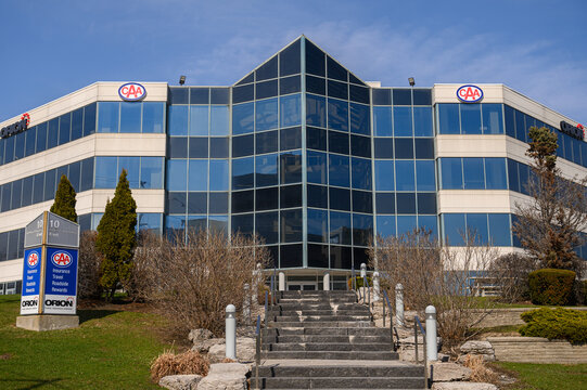 Company logos and building signs for CAA and Orion in Toronto