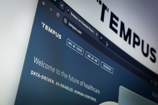Raleigh, North Carolina - August 4, 2026: Close-up of a computer screen showing the Tempus (TEM) website and logo in the background.