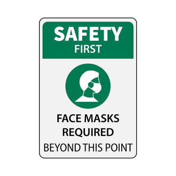 Safety first face masks required beyond this point sign