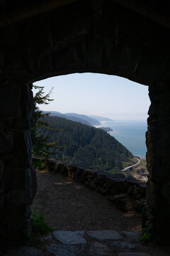 View through window of Oregon coastline, west shelter stone building built by the Civilian Conservation Corps, CCC, Cape Perpetua Scenic Area, outdoor recreation
