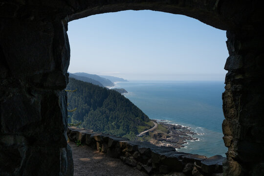 View through window of Oregon coastline, west shelter stone building built by the Civilian Conservation Corps, CCC, Cape Perpetua Scenic Area, outdoor recreation
