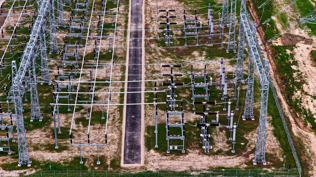 Aerial view of electrical substation with metal structures, power lines, and transformers in Tume, Tukums Municipality, Latvia.