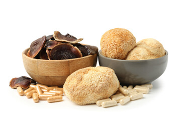 Different functional mushrooms and pills isolated on white © New Africa